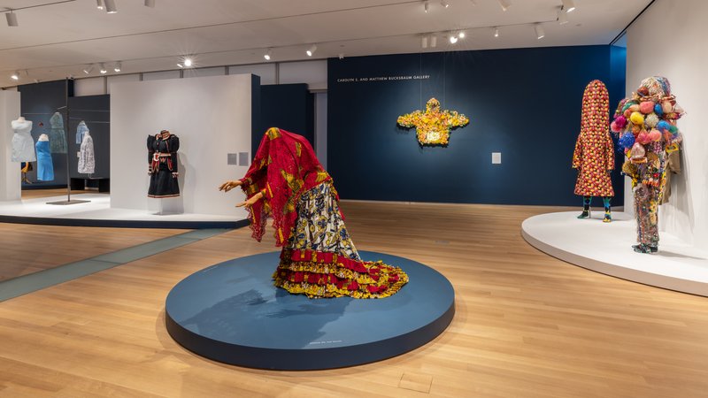 Contemporary art exhibition with visitors viewing artwork