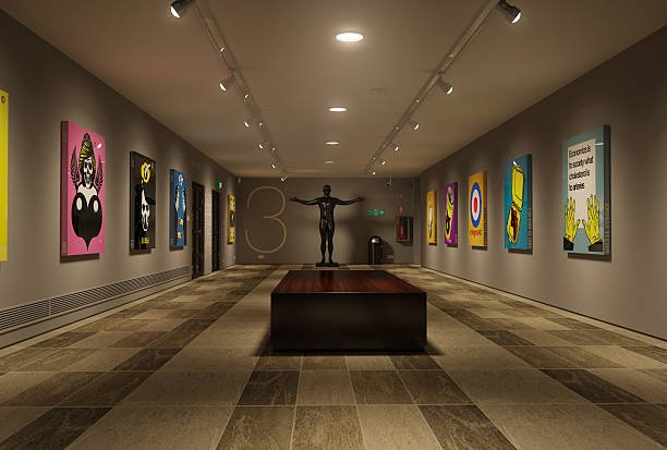 Modern art gallery interior with white walls and artwork displays